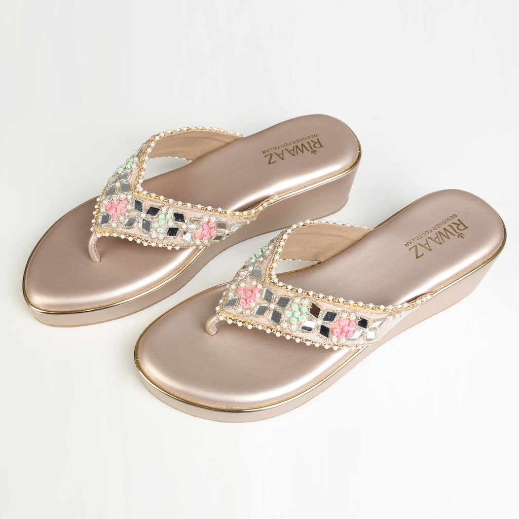 Dull rose gold handcrafted wedge platform sandal with mirror mosaic embellishments, pastel French knot embroidery, and pearl detailing – Riwaaz Pastel Bloom Collection