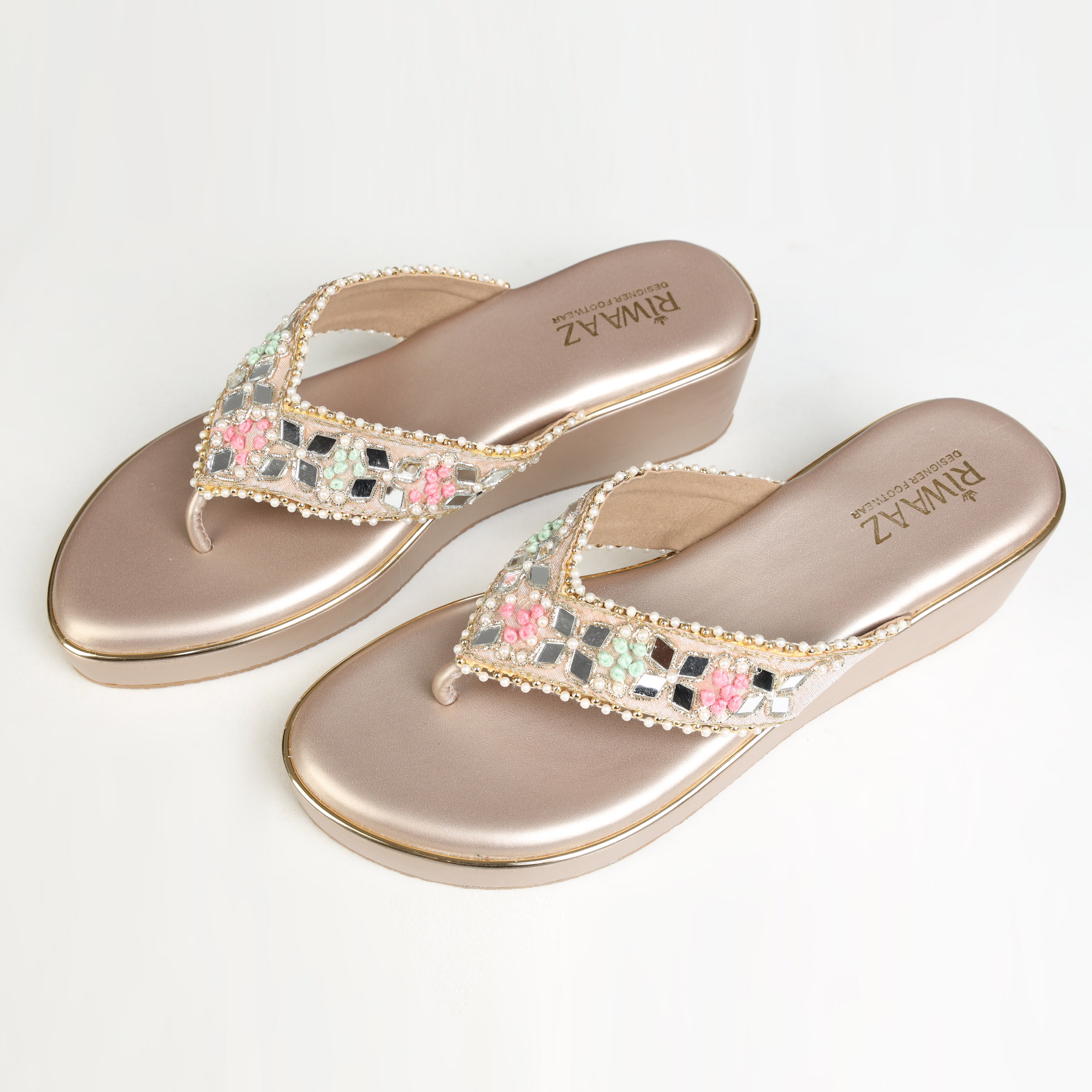 Dull rose gold handcrafted wedge platform sandal with mirror mosaic embellishments, pastel French knot embroidery, and pearl detailing – Riwaaz Pastel Bloom Collection
