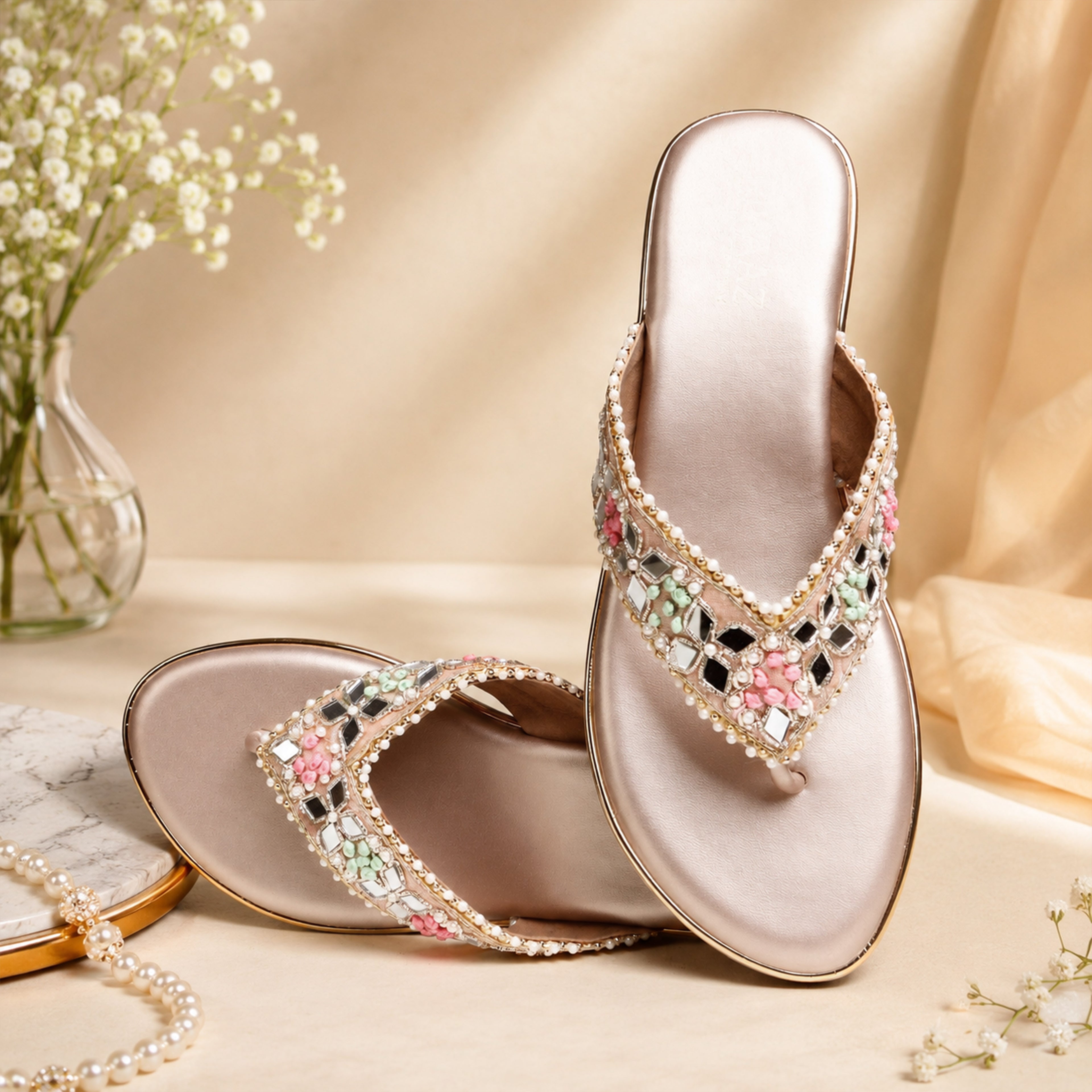 Model wearing Riwaaz Pastel Bloom dull rose gold wedge platforms with pink embroidered salwar suit