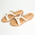 Dark beige Riwaaz Pearl Royale pearl-embellished crossover strap cork wedge sandals product shot with gold accents