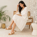 Side view of Riwaaz Pearl Royale cork wedge sandal showing pearl embellished strap and cork wedge heel