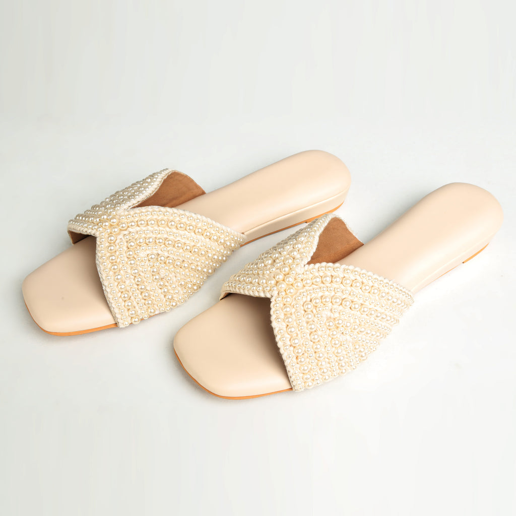 Riwaaz Noor-e-Moti bridal pearl flat slides – pair laid flat on white background showing full pearl coverage and beige insole