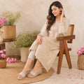 Pair of Riwaaz Chandni Glow dull gold wedge sandals on white background – side angle showing 2-inch wedge profile and gold trim detail