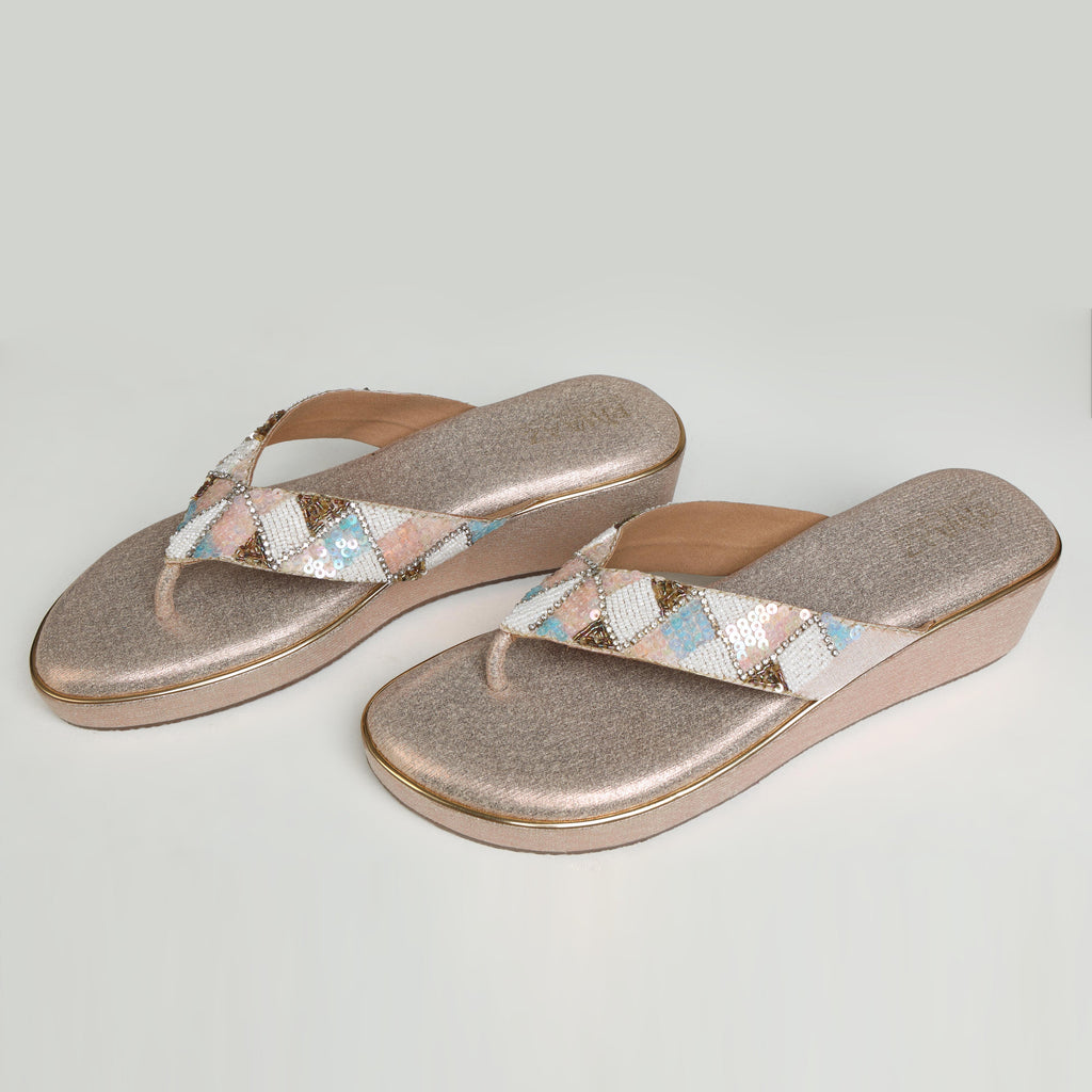Single Riwaaz Afreen dull rose gold pastel geometric beaded thong wedge platform – side profile on white background showing wedge height, gold trim and intricate pastel diamond beadwork strap detail